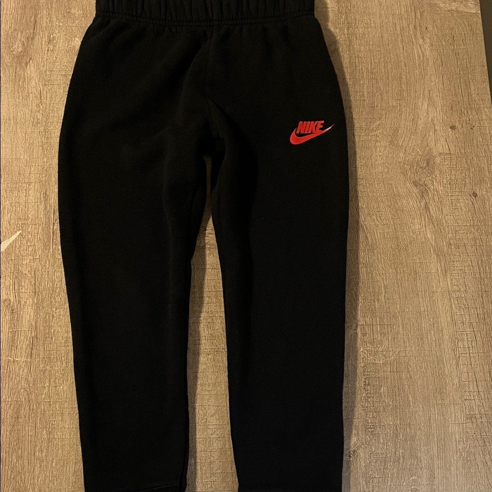 Nike Kids Black Sweatpants with Red Logo